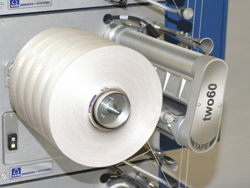 SAHM two60 TAPE - Präzisions-Kreuzspulmaschine Spulkopf einer SAHM Präzisions-Kreuzspulmaschine, Modell two60 TAPE