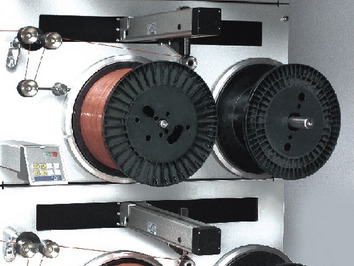 SAHM 750XE TAPE - Automatische Parallel-Spulmaschine Detailfoto einer automatischen Parallel-Spulmaschine, Modell SAHM 750XE TAPE