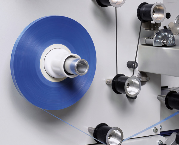 [Translate to 01 - Deutsch:] Pancake bobbin on a SAHM winding machine - model SAHM 460XE Series