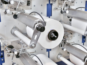 SAHM 260XE TAPES / MONOFILAMENTS - Präzisions-Kreuzspulmaschine Spulkopf einer SAHM Präzisions-Kreuzspulmaschine, Modell SAHM 260XE TAPES / MONOFILAMENTS